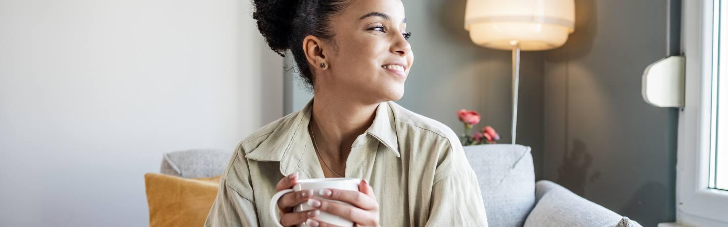 Woman drinks coffee